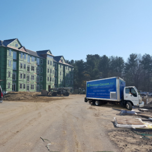 truck-in-front-of-building-green-cocoon-spray-foam-insulation