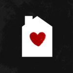 Photo of a house with a heart inside. 